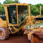 Grader on gravel road